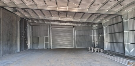 Steel shed with concrete