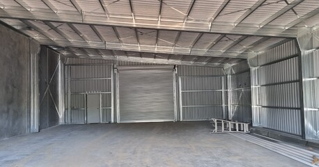 Steel shed with concrete