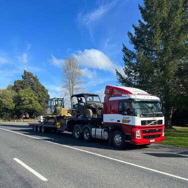 Williams salvage tow truck out with 2 vehicles behind it