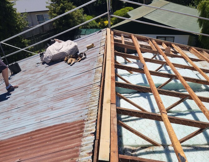 a worn out roof in Hamilton causing damage to trusses and framing from strong winds and rain in Hamilton