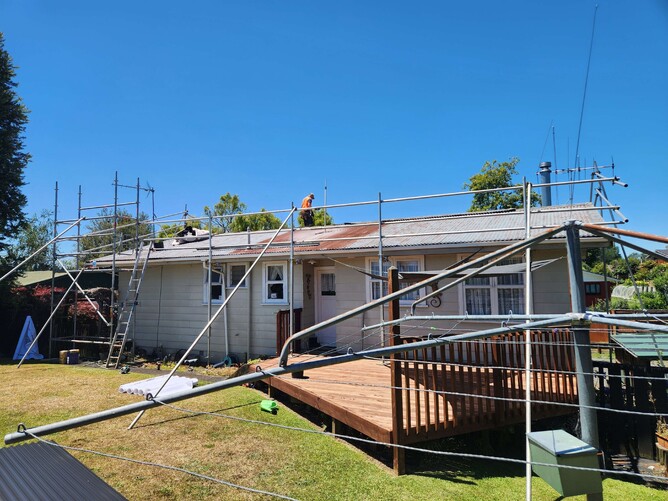 Hamilton roof with steep pitch and scaffolding setup