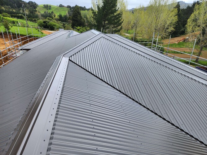 Long run roofing installed in a Waikato Home overlooking the farmlands
