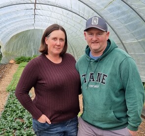 Jarrod and Michelle Busby standing in the market garden