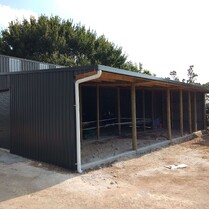 truck shed with outside horse stable boxes