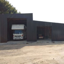 truck shed with outside horse stable boxes