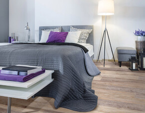 Wood and Laminate Flooring vs. Carpet in Bedrooms: What's Best for Your Home?