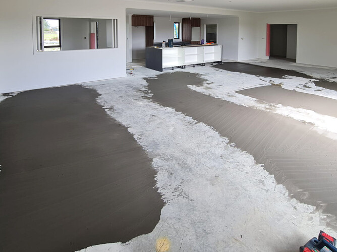 Concrete floor levelling before installing a floating floor.