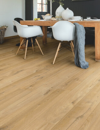 Interior image showing Quick Step Impressive flooring installed in a dining room.
