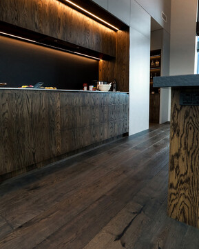 Dark wood look flooring swatch.