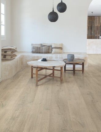 Scandi style home with a light beige laminate plank flooring.