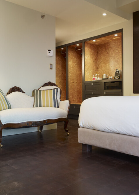 A brown leather floor in a hotel suite. 