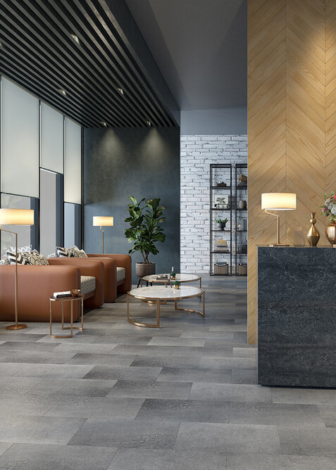 Grey vinyl tile hybrid floor in a office waiting area.