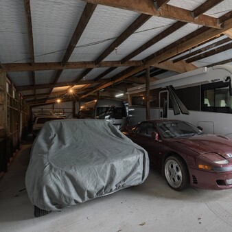 vehicles inside PB Group storage shed