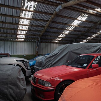 Covered vehicles inside PB Groups indoor storage facility