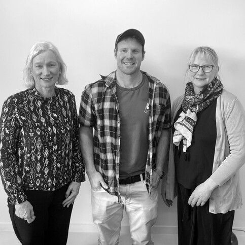 Team at Logic Physio, lead by physiotherapist Brett Crossan, collaborating and discussing patient care. Each member contributes their unique expertise and dedication to help patients achieve their rehabilitation and physical wellbeing goals.