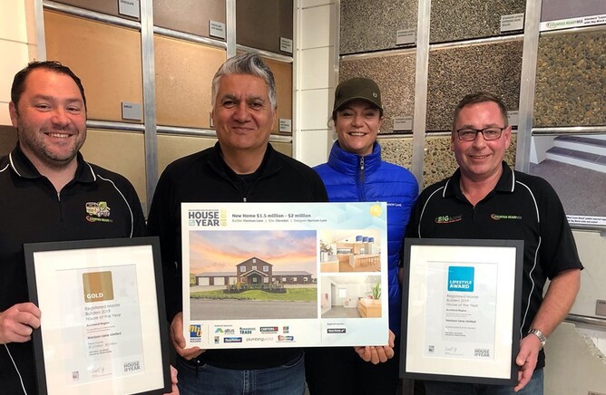 Laura Daly with Kyle Dunn (from left), Paul Tapola & Willie Moreland from Counties Ready Mix