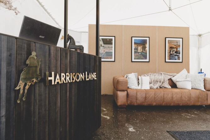 Bespoke Harrison Lane cabinetry with brass sign