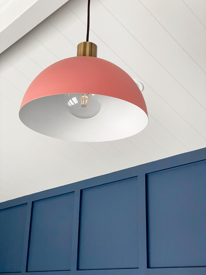 Feature pendant light finished in dusky pink colour and brass fitting