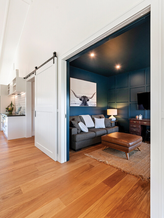 Living area with timber panelling and vaulted ceilings