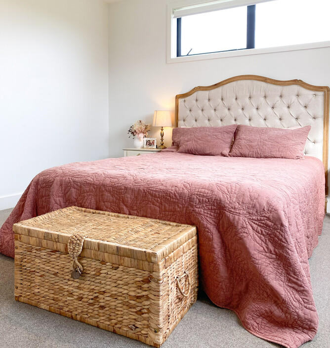 Bedroom with french country style bed