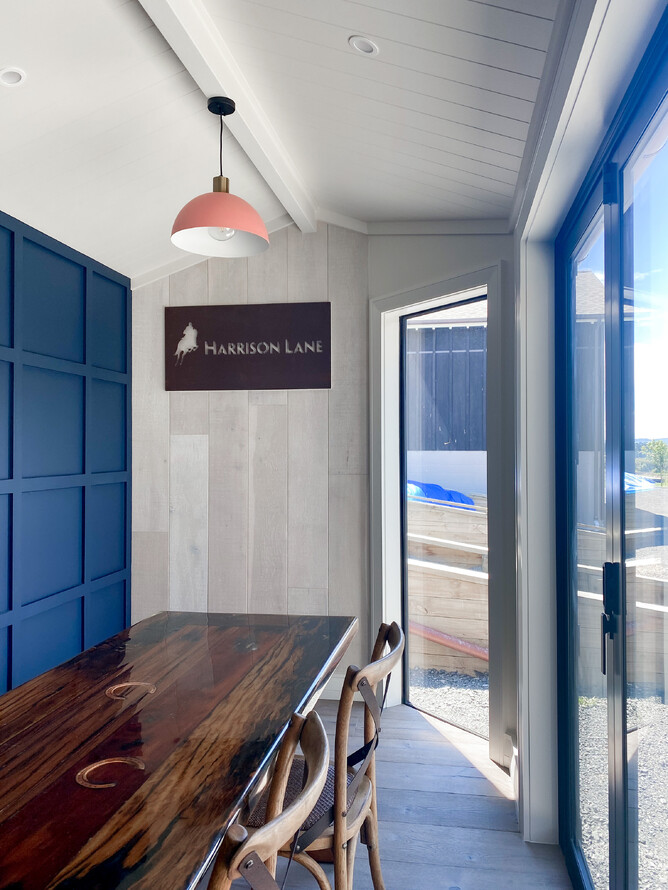 Interior shot of the cabin showing decorative ceiling and bifold doors