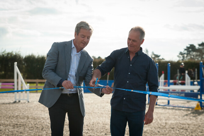 Andrew Bayly and Blyth Tait cut the ribbon to open the arena
