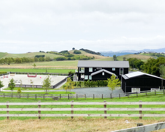 A rural lifestyle project with large stables and barn-style apartment living, equestrian arena and additional farm storage and truck barn