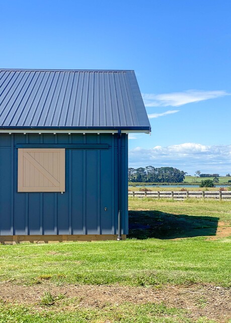 storage room with built in ply cabinetry