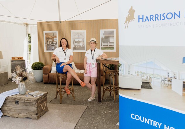 Mia the rottweiler sitting on a hay bale