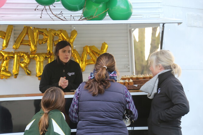 Cambridge Raceway's Robyn Clapperton and Shannon Bint-Popplewell serving carrot cupcakes out of the CR Horse Float Bar - Photo: Picket Fence