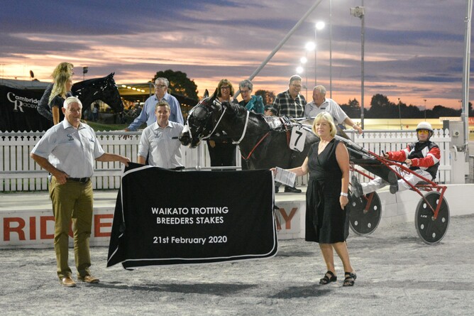 Connections pose with Pretty Majestic after her win in the Waikato Trotting Breeders' Stakes. Photo: Chanelle Lawson