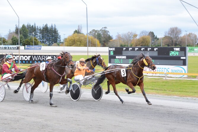 Dr Luk Chin and Safrakova (right) taking out the Happy 40th Glenn Wallis Handicap Trot - Photo: Chanelle Lawson