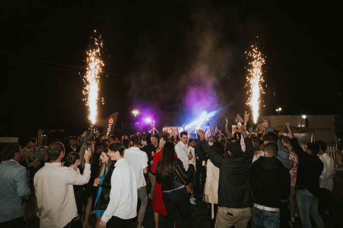Racegoers enjoy the after party at the 2023 The Race by Grins - Photo: Sean Peterson
