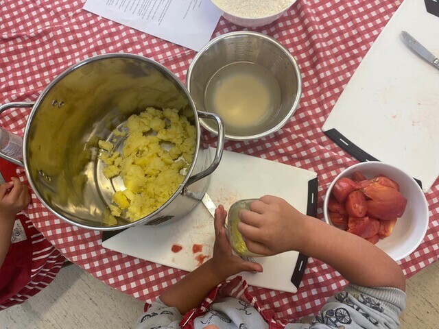 Image of young children cooking under the Garden To Table Programme. 