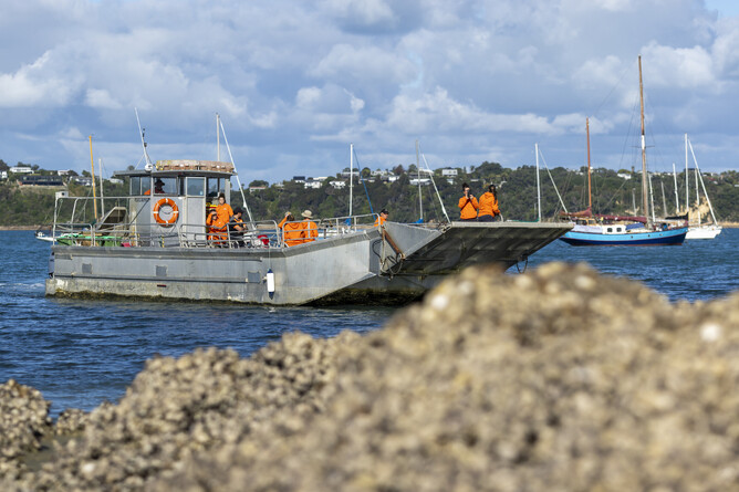 Image of the grey barge at Kennedy Point for the Save the Kiwi mission in May 2025.