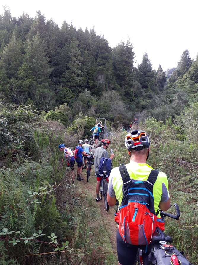 Queues of Bikepackers battling the old bridge