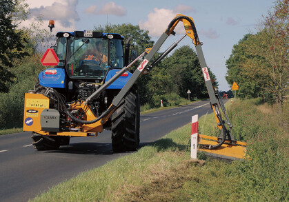 New Holland T5 with Rolmex Power Arm