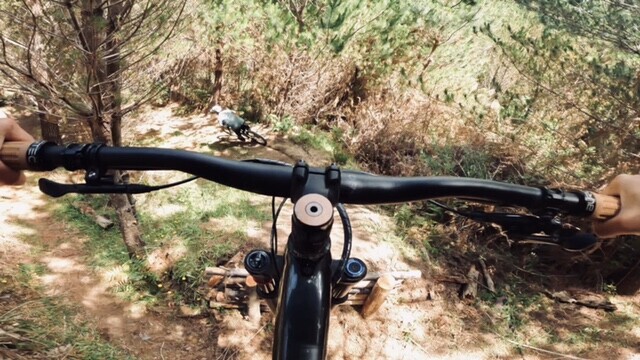 Jordana following Matiu off the entrance drop on Crank