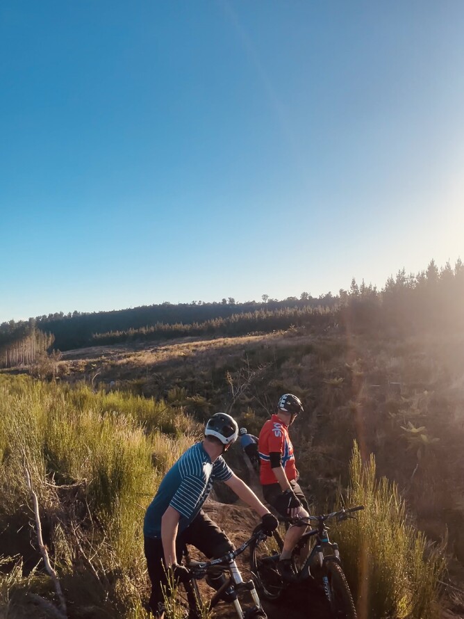 Zach and Wayne watching Matiu head down Loose Chain