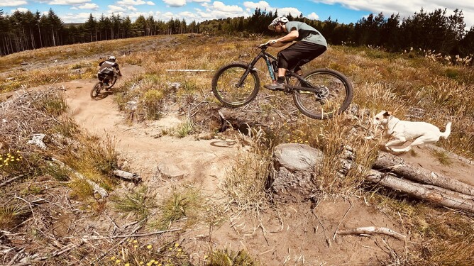 Greg and Matiu riding down Boost