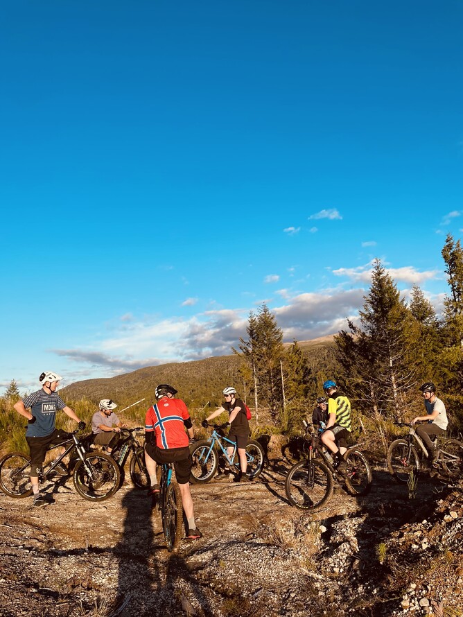 WNR crew hanging out at the bottom of Loose Chain before continuing along the gravel road to the top of Cog Wild