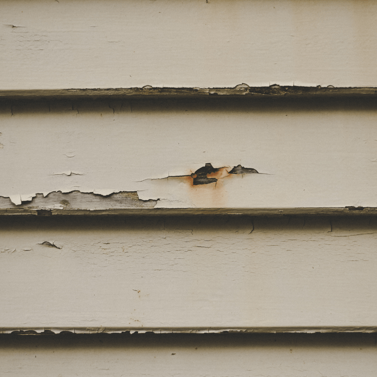 external cladding repairs needing to be performed by Bay Rebuild to a Rotorua home showing cracks and peeling in the exterior cladding