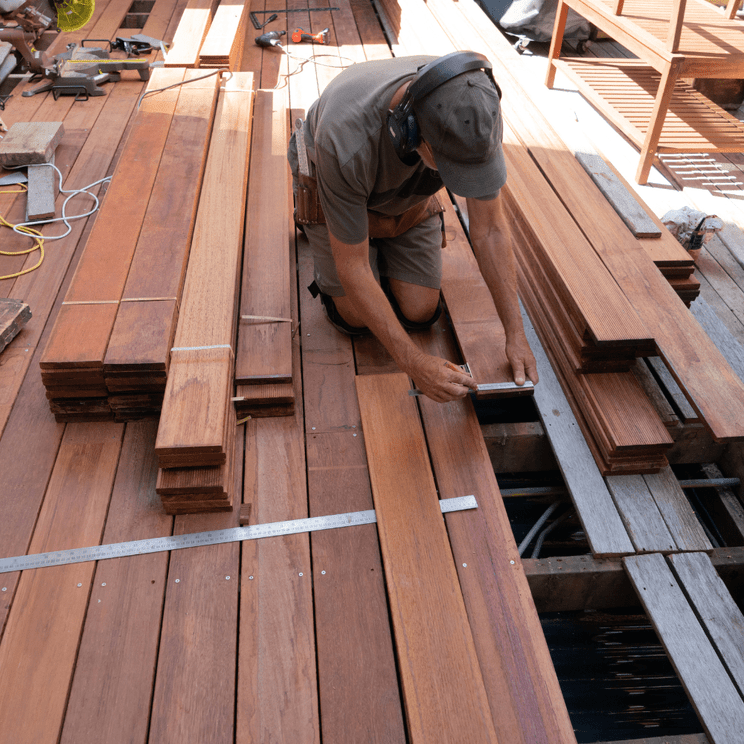 Fence and deck repairs or replacements - new decking being installed in a Rotorua home