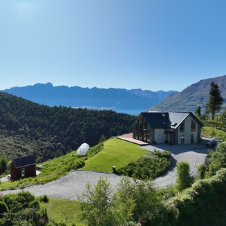 Timber ceiling with a skylight allowing ample natural light into the home.
