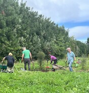 Looking after the arboretum trees after forest bathing therapy at Arcus venue and nature retreat 2023