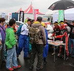 Long line of fans queue for autographs at Rally Show