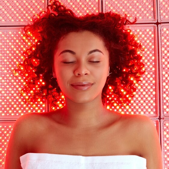 Image of a woman relaxing during a LightStim treatment