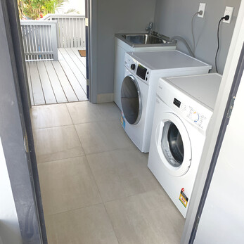 Laundry facilities (shared between the two apartments)