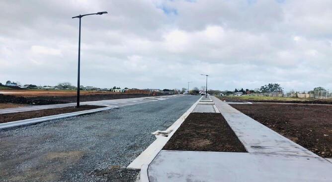 Stage 20 – Light poles in, concrete works completed, and berms topsoiled