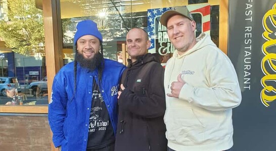 “Sam Troth with community members during outreach — connecting through kōrero and shared purpose.